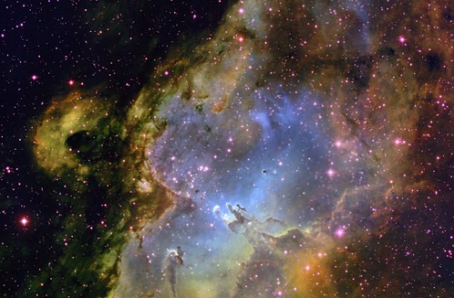 tall pillars and round globules of dark dust and cold molecular gas in star clouds.jpg