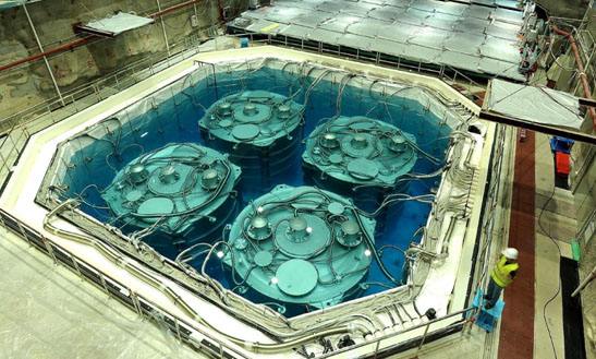 Four of the eight antineutrino detectors at the Daya Bay Neutrino Experiment, successfully installed and taking data.jpg