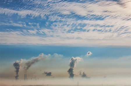 Local Emissions Amplify Regional Haze and Particle Growth
